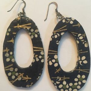 Blue dangle white/gold design. Lightweight Wood.